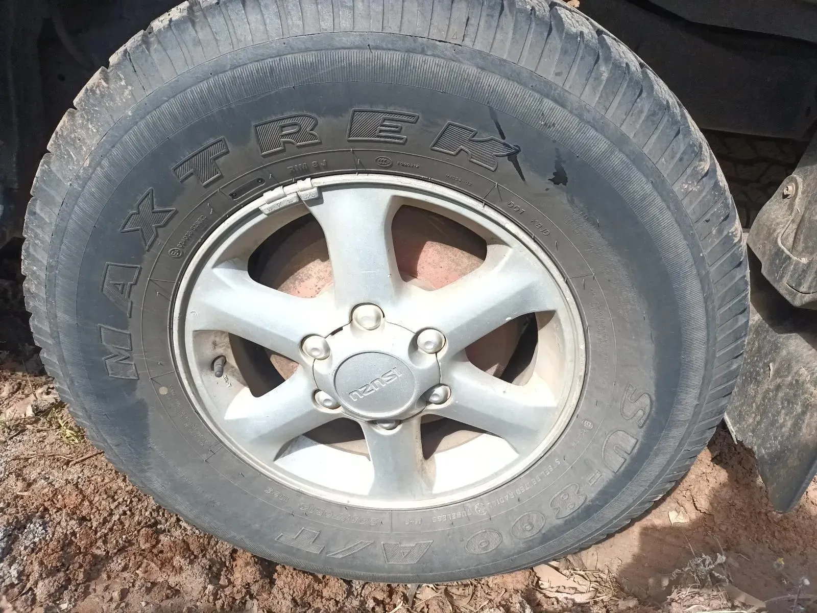 Close-up of a Car Tyre on a Silver Rim — South West 4WD Wreckers In Brisbane, QLD