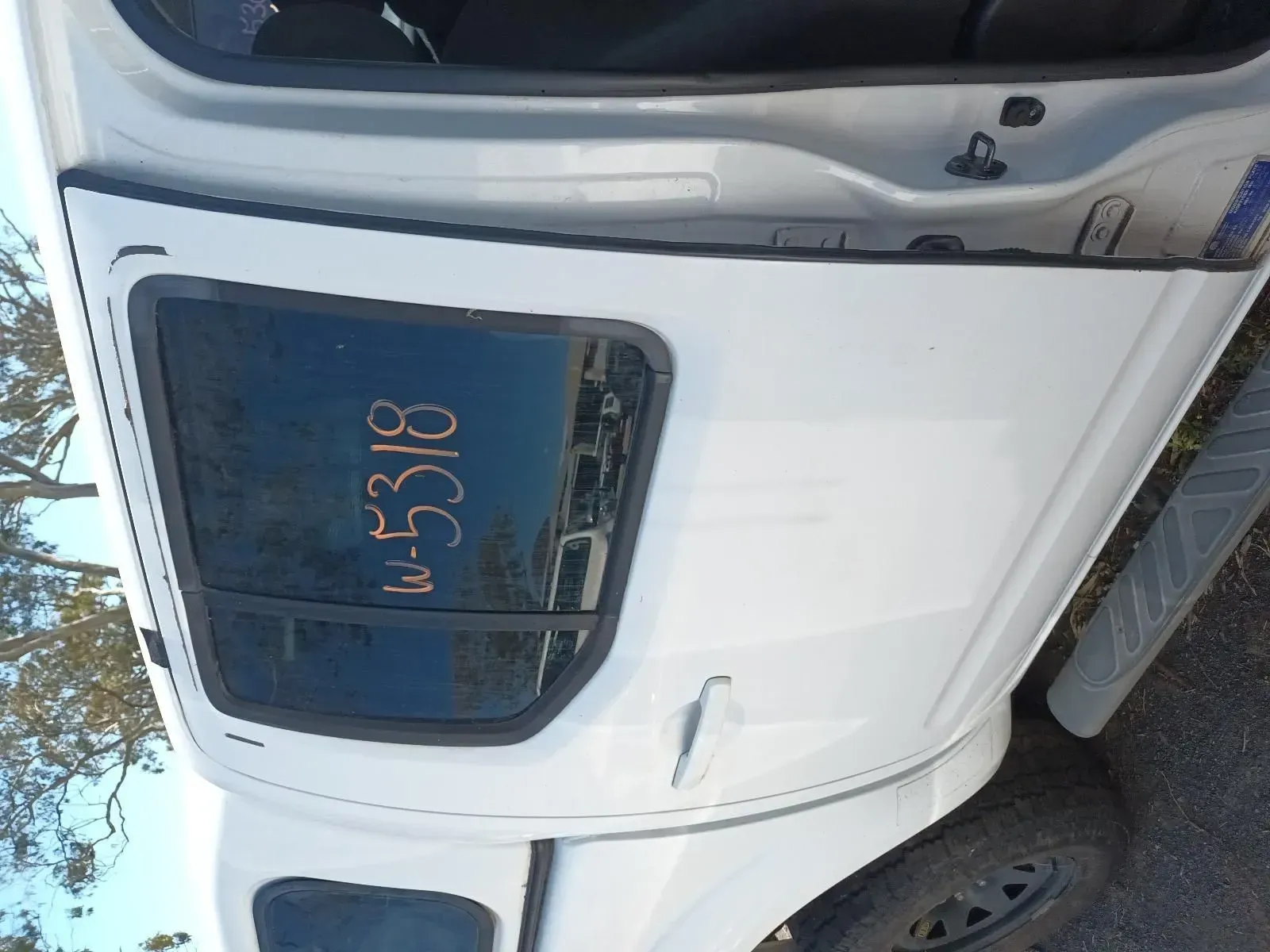 White Truck Door With a Dark-tinted Window — South West 4WD Wreckers In Brisbane, QLD