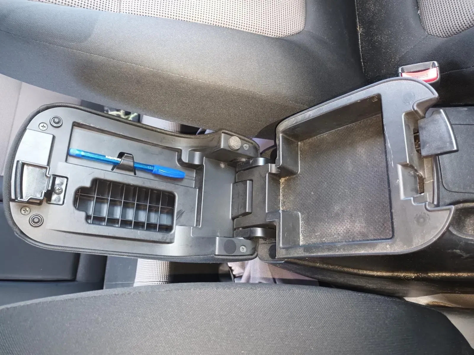 Open Car Console With Compartments and a Blue Pen Inside — South West 4WD Wreckers In Brisbane, QLD