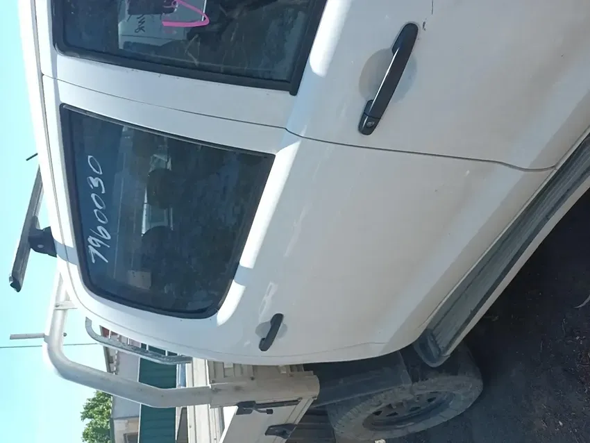 A White Truck is Parked on the Side of the Road — South West 4WD Wreckers In Brisbane, QLD
