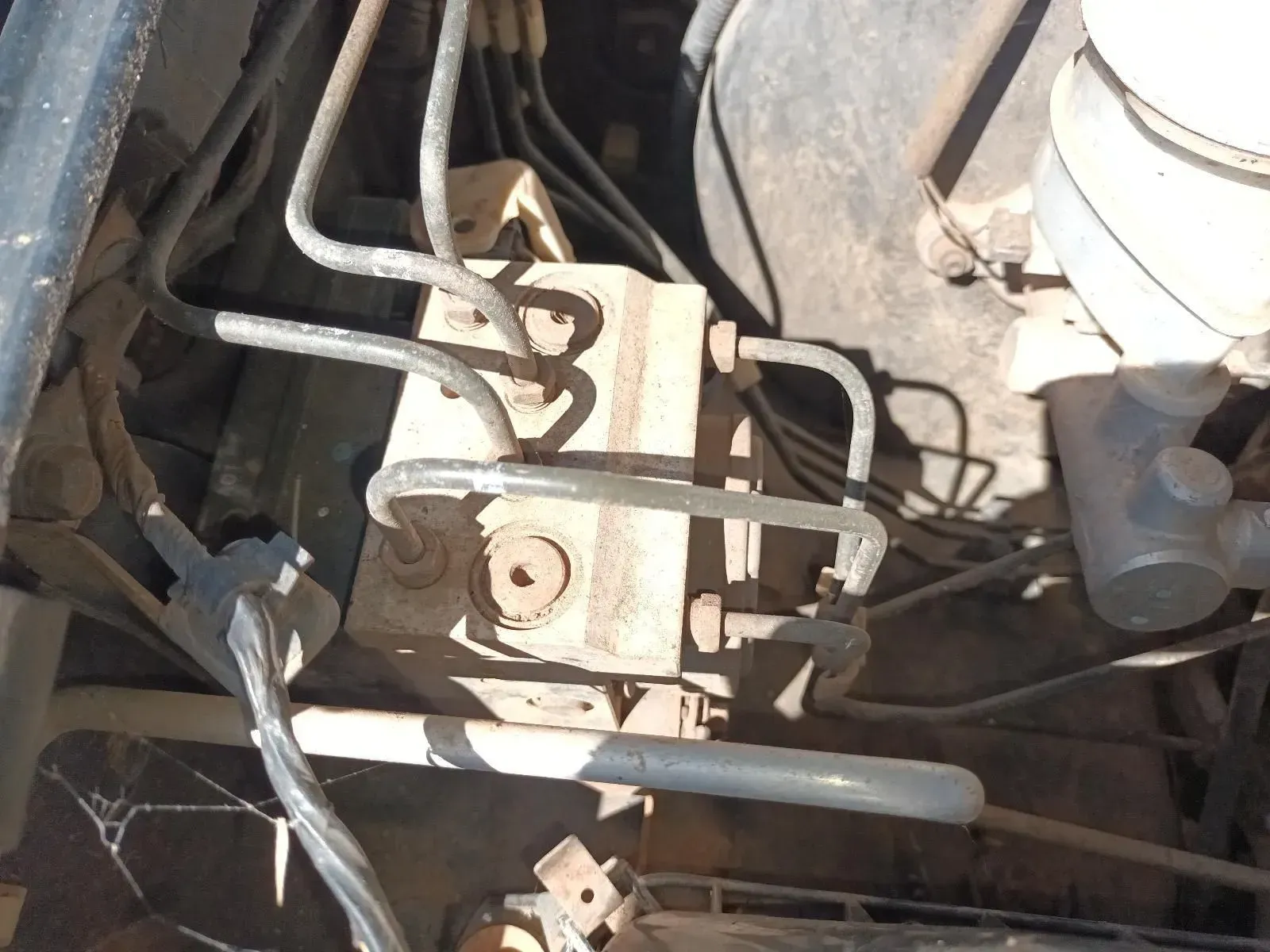 Rusty Metal Brake Valve With Connected Tubes and Wires — South West 4WD Wreckers In Brisbane, QLD