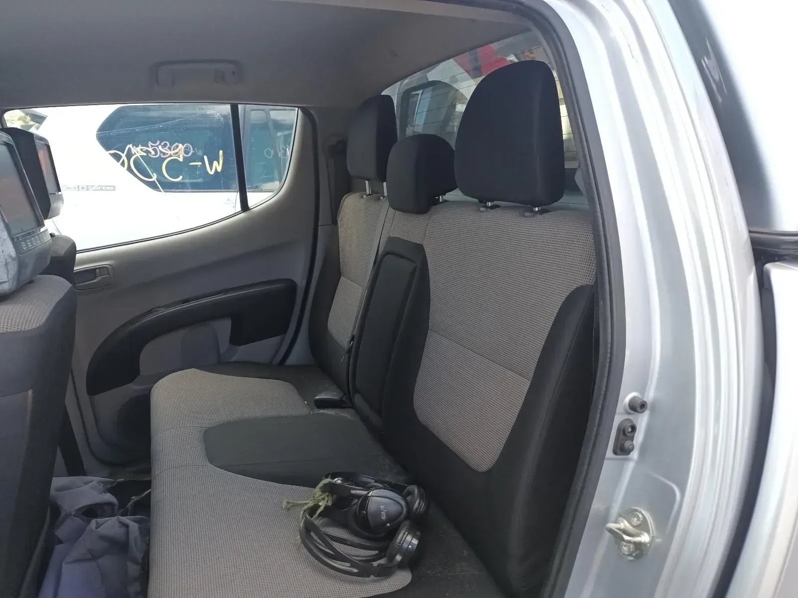 Interior Rear of a Silver Pickup Truck With Gray Seats and Black Headrests — South West 4WD Wreckers In Brisbane, QLD