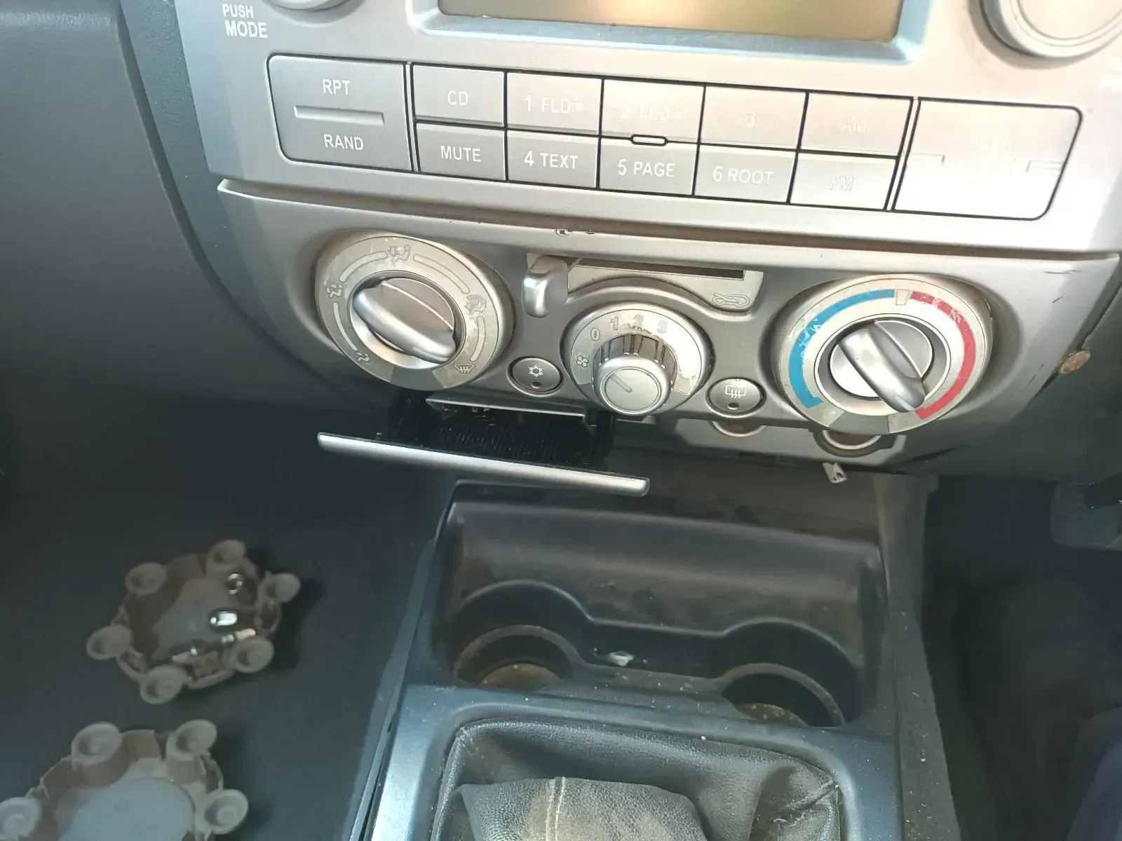 Dashboard With Climate Controls and Cup Holders in a Car — South West 4WD Wreckers In Brisbane, QLD