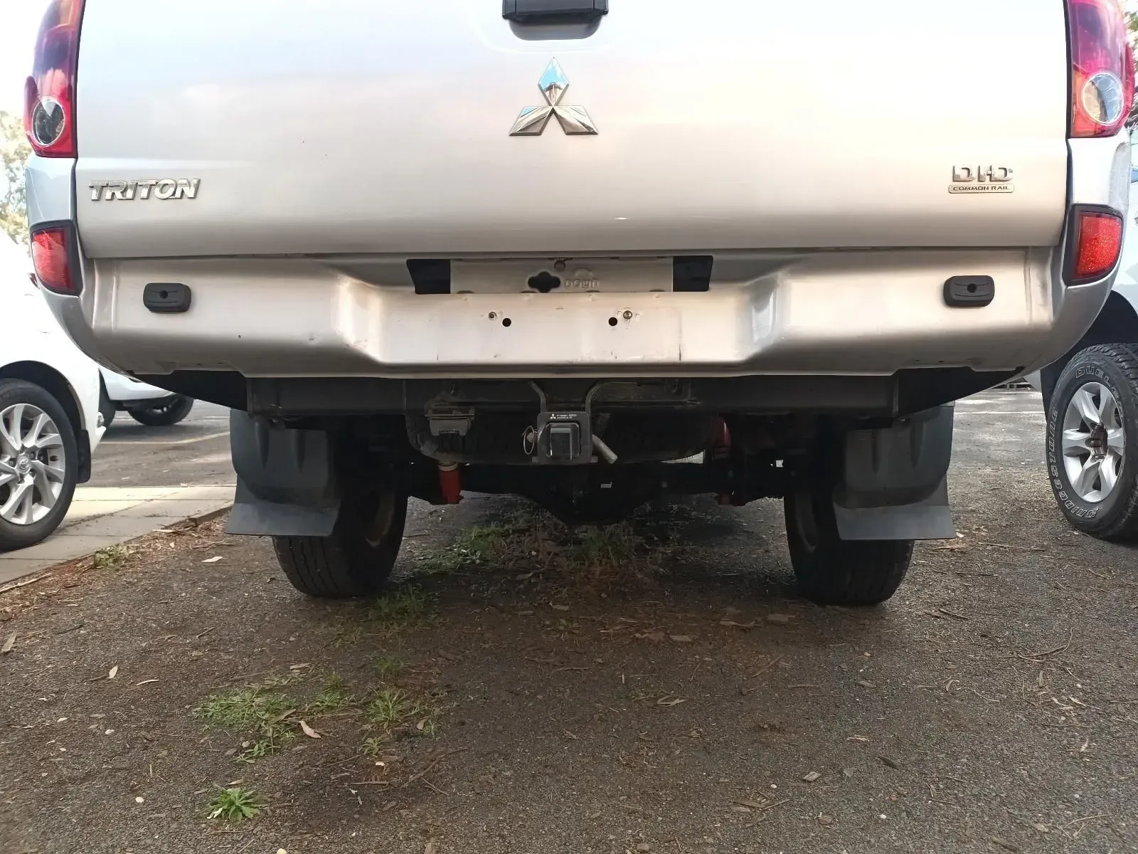 Rear View of a Silver Mitsubishi Triton Pickup Truck — South West 4WD Wreckers In Brisbane, QLD