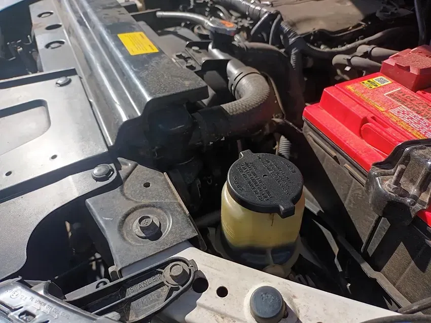 A Close Up of a Car Engine with a Red Battery — South West 4WD Wreckers In Brisbane, QLD