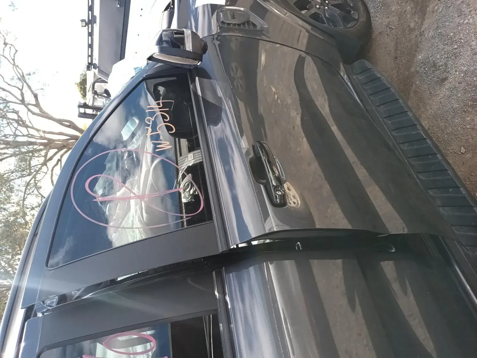 Dark Grey Pickup Truck With Side Steps and Cracked Window — South West 4WD Wreckers In Brisbane, QLD