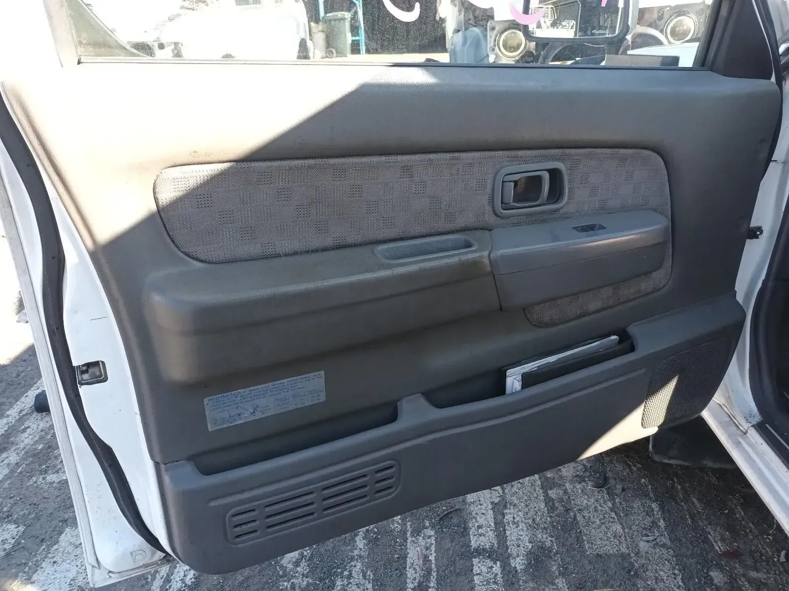 Car Door Panel, Gray and Tan, Showing Handle — South West 4WD Wreckers In Brisbane, QLD