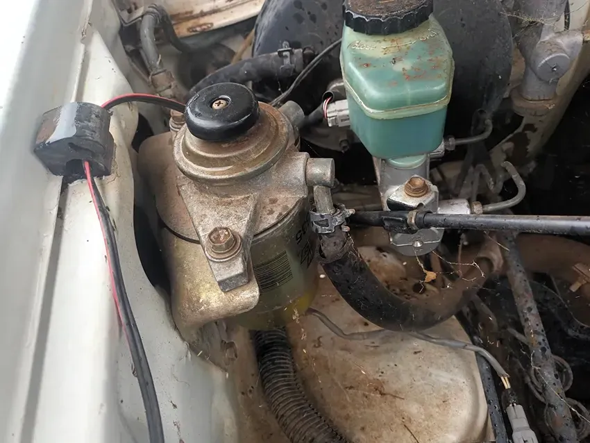 A Close Up of a Car Engine With a Fuel Filter — South West 4WD Wreckers In Brisbane, QLD 