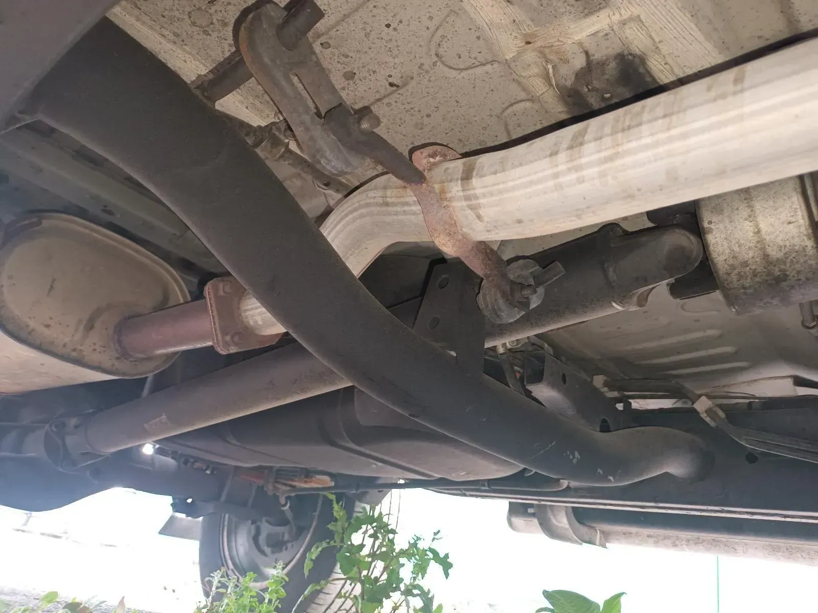 Undercarriage of a Vehicle Showing Exhaust System Components — South West 4WD Wreckers In Brisbane, QLD