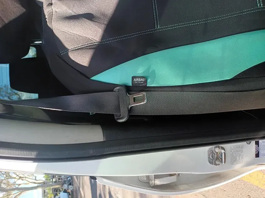 A Person is Sitting in the Back Seat of a Car — South West 4WD Wreckers In Brisbane, QLD