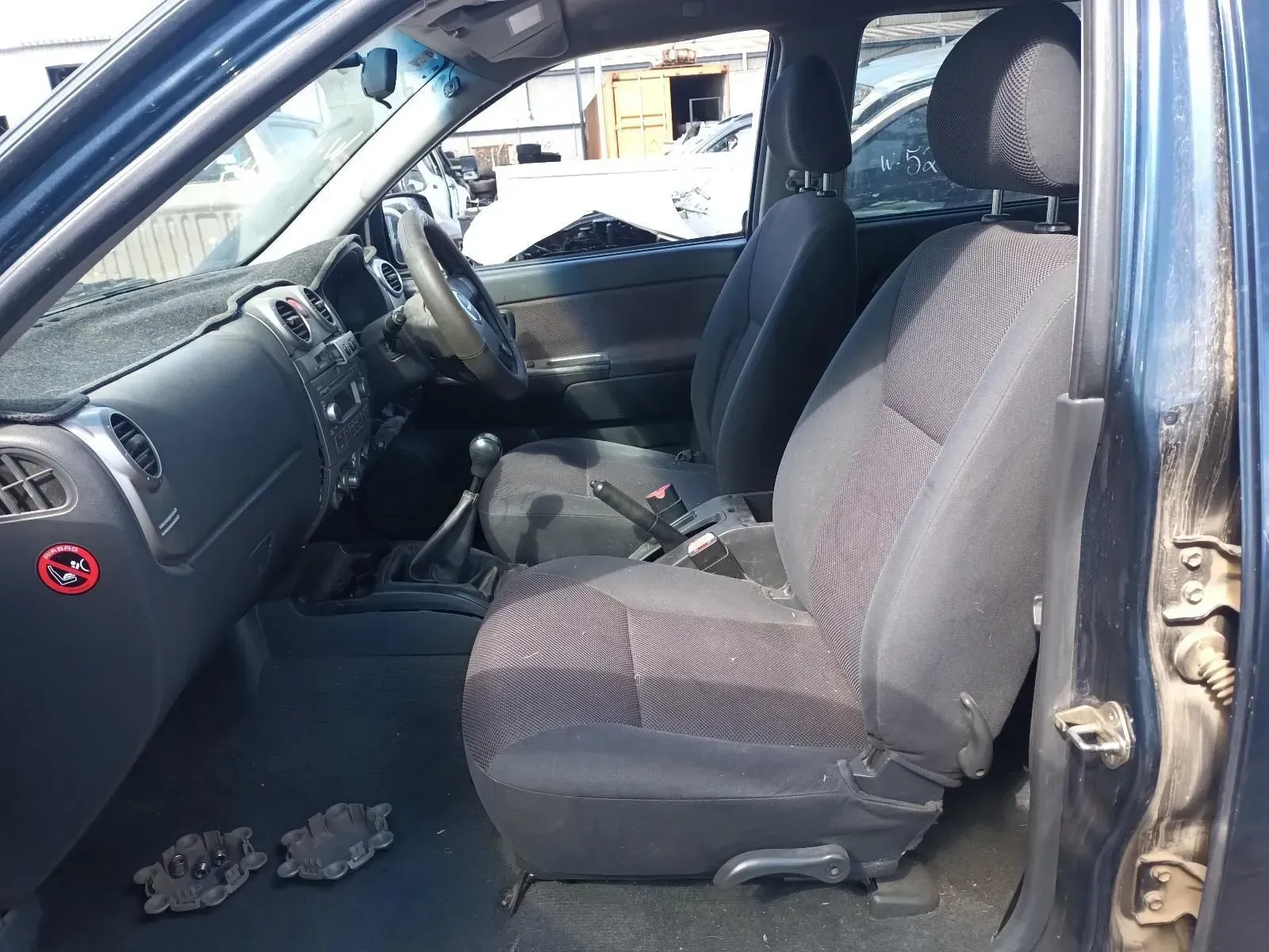 Interior View of a Dark Blue Pickup Truck With Black Seats and Dashboard — South West 4WD Wreckers In Brisbane, QLD