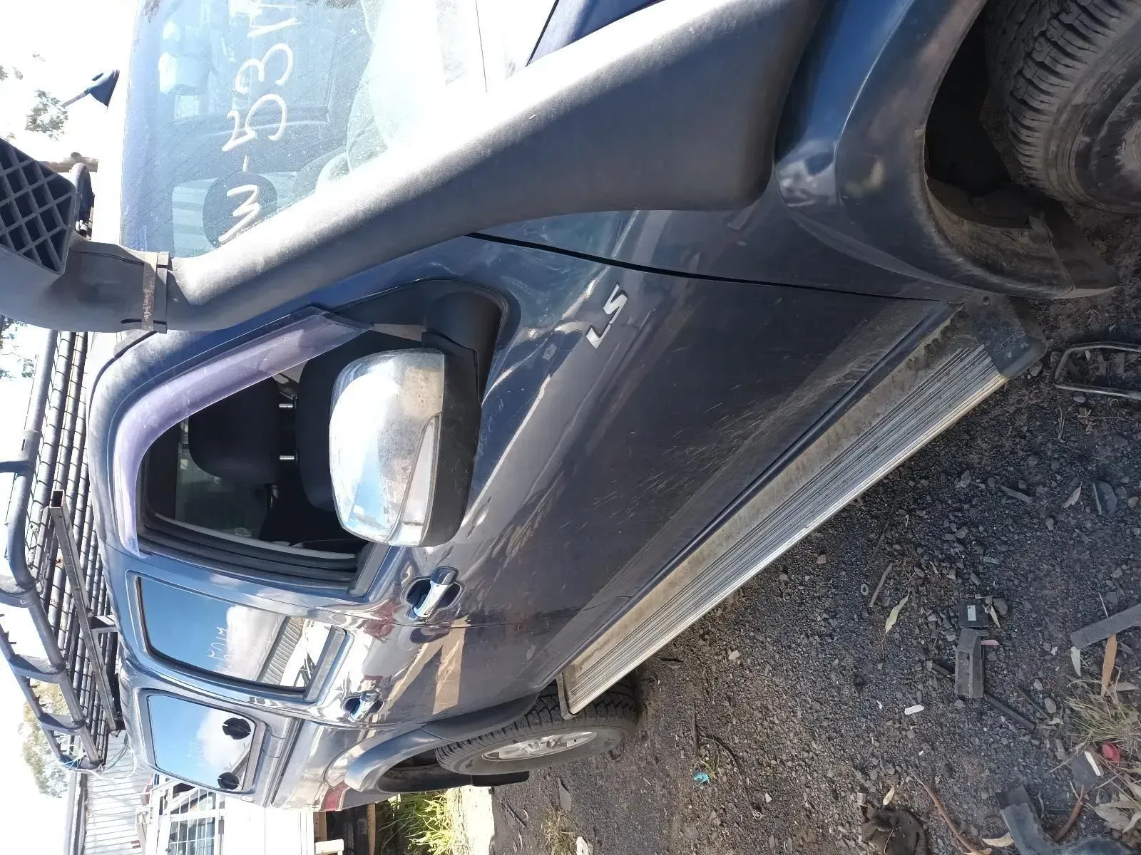 Blue Pickup Truck With Silver Side Steps, Snorkel, and Chrome Side Mirror — South West 4WD Wreckers In Brisbane, QLD