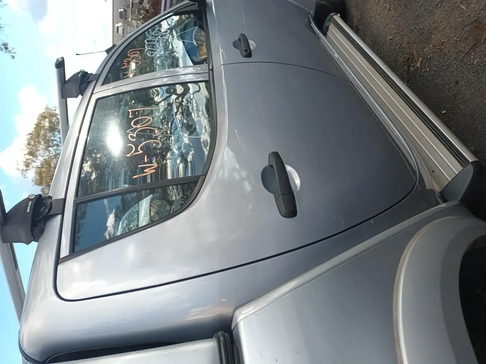 Silver Pickup Truck Parked Outside, With Running Boards and Roof Racks — South West 4WD Wreckers In Brisbane, QLD