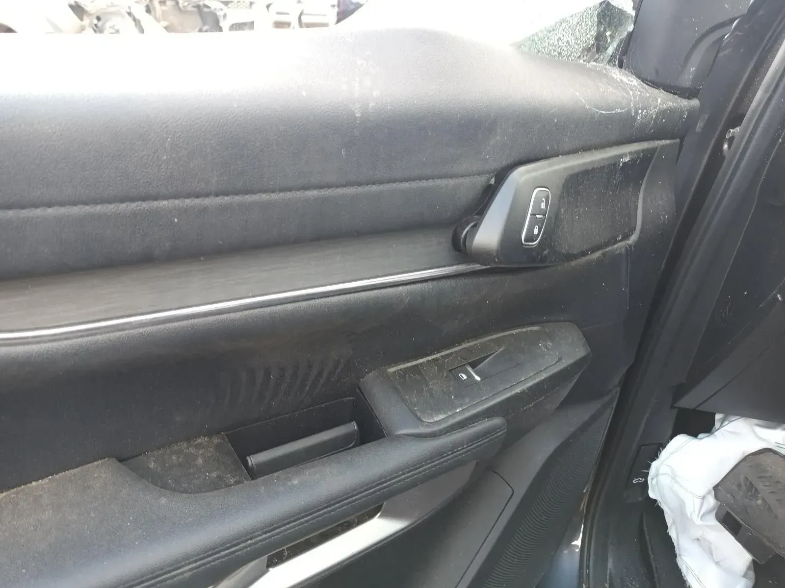 Black Car Door Interior With Controls, Window Switch, and Armrest — South West 4WD Wreckers In Brisbane, QLD