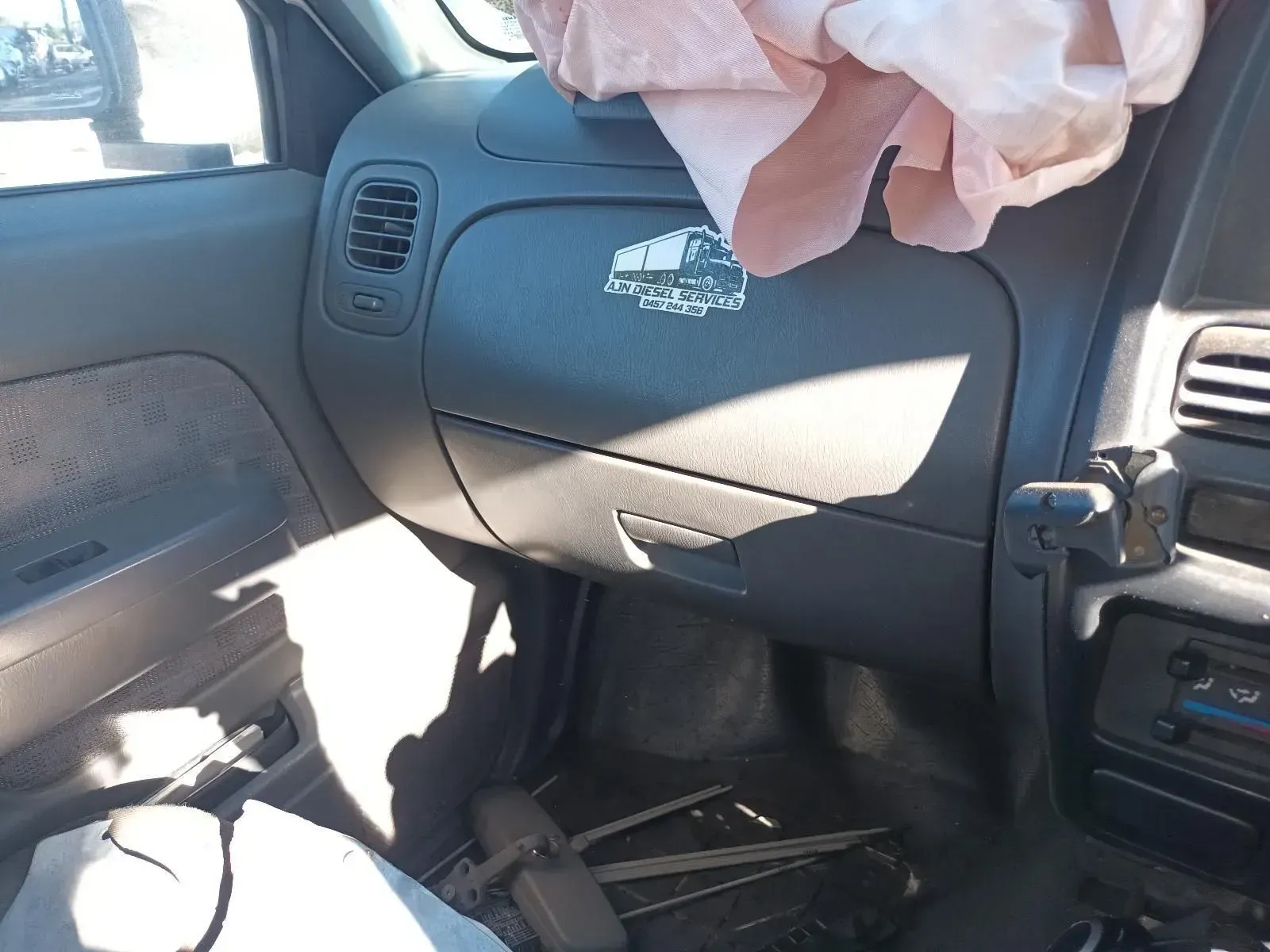 Interior of a Car With Deployed Airbag and Open Glove Compartment — South West 4WD Wreckers In Brisbane, QLD