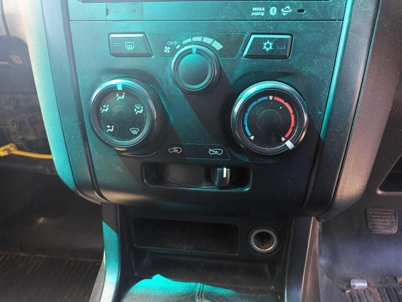 A Close Up of a Car Dashboard With Ac Switch Panels — South West 4WD Wreckers In Brisbane, QLD