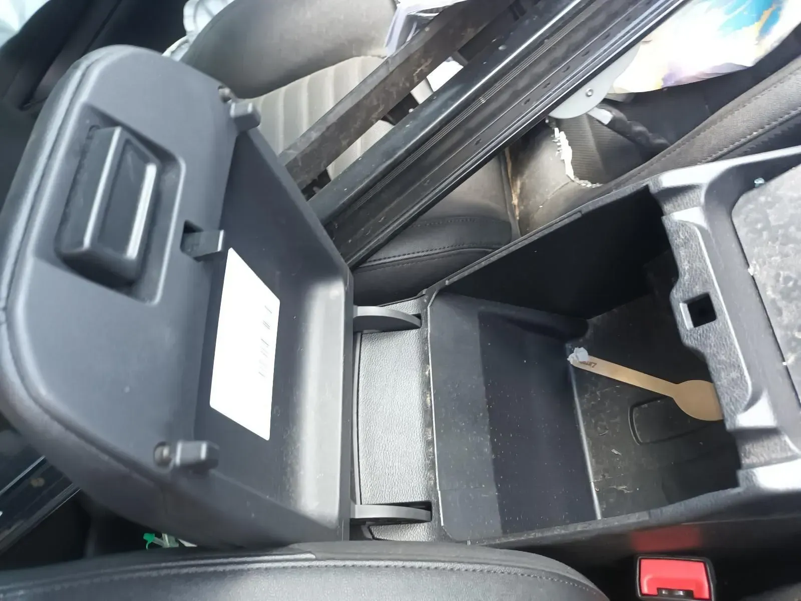 Open Car Console With Lid Propped, Revealing Interior Storage — South West 4WD Wreckers In Brisbane, QLD