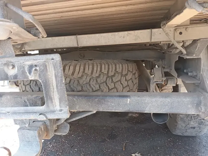 A Close Up of the Underside of a Truck With a Tire on It — South West 4WD Wreckers In Brisbane, QLD
