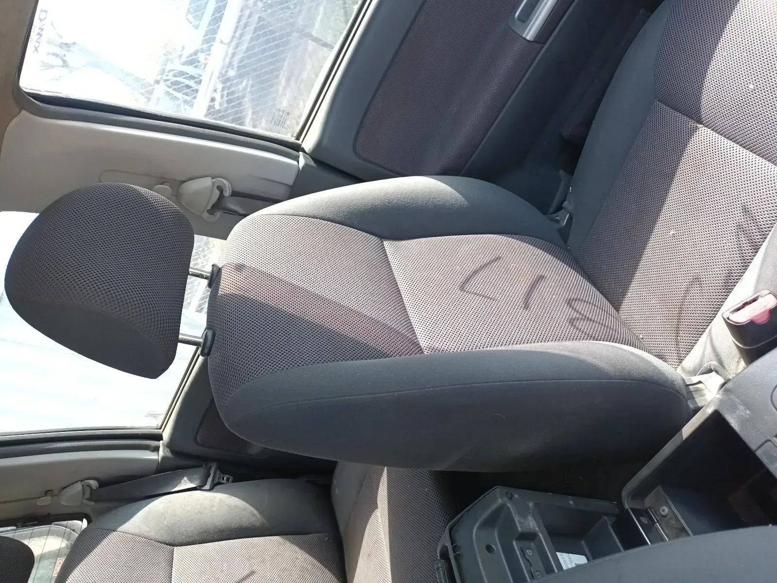 Gray Car Seat With Headrest, Close-up Inside a Vehicle — South West 4WD Wreckers In Brisbane, QLD