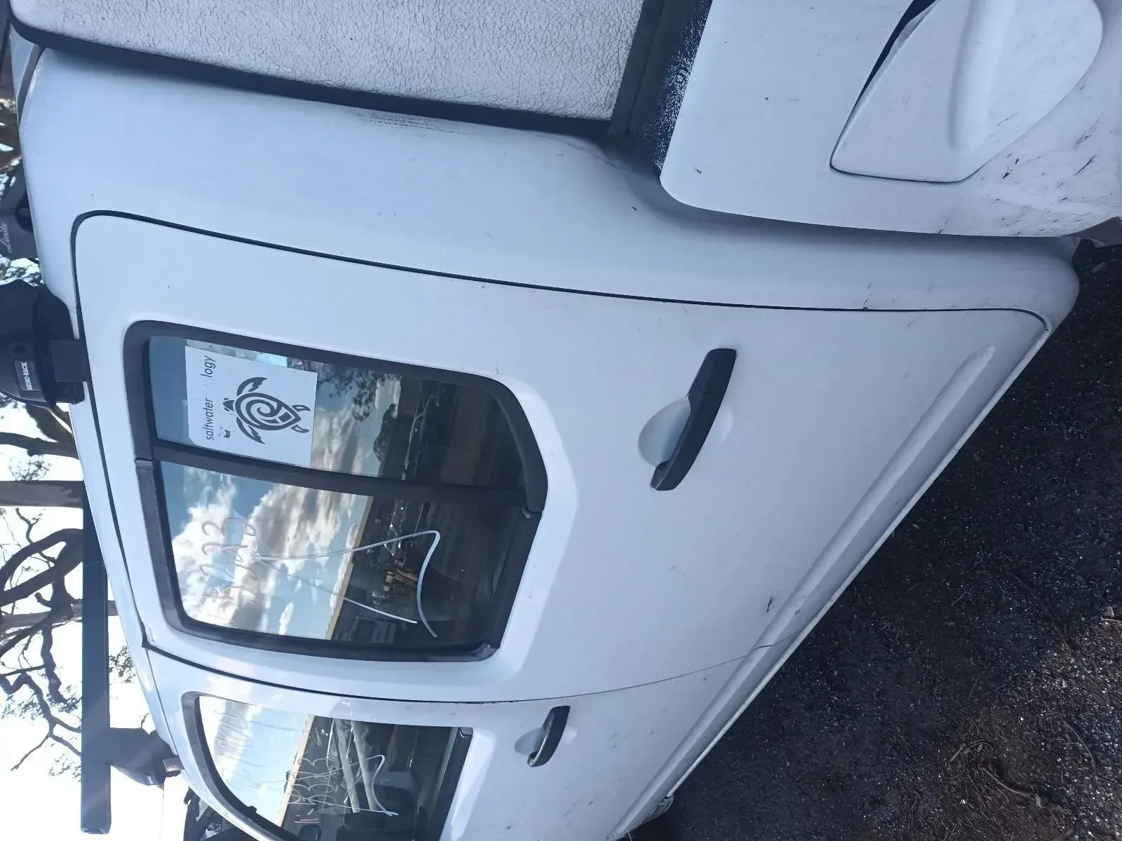 White Car Door With a Black Handle and Tinted Window, Outdoors — South West 4WD Wreckers In Brisbane, QLD