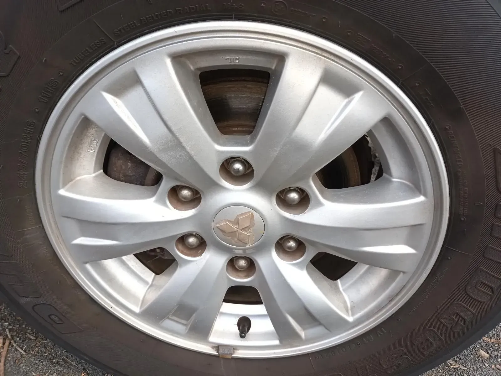 Silver Car Wheel With a Black Tyre — South West 4WD Wreckers In Brisbane, QLD