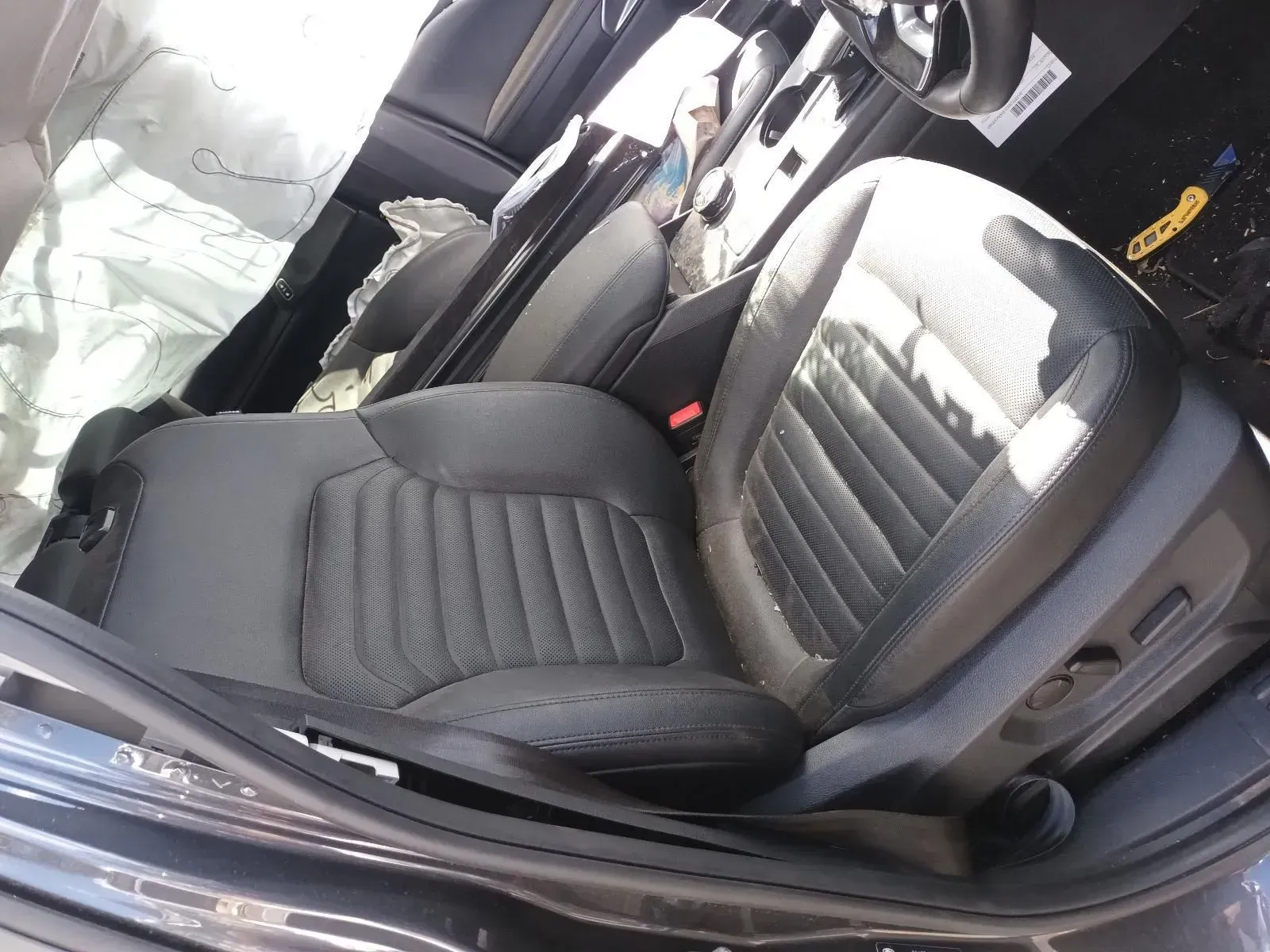 Car Interior Showing a Black Seat, Potentially Damaged — South West 4WD Wreckers In Brisbane, QLD