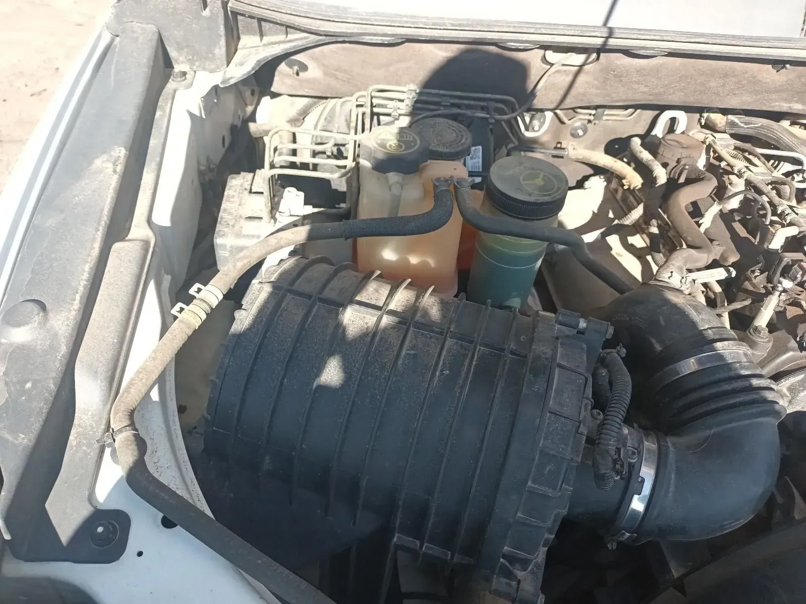 Engine Compartment With Air Filter, Coolant Reservoir, and Hoses — South West 4WD Wreckers In Brisbane, QLD