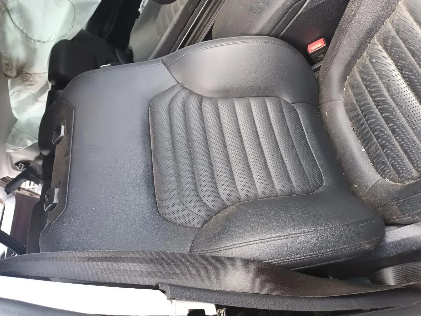 Black Leather Car Seat With Vertical Ribbed Design — South West 4WD Wreckers In Brisbane, QLD