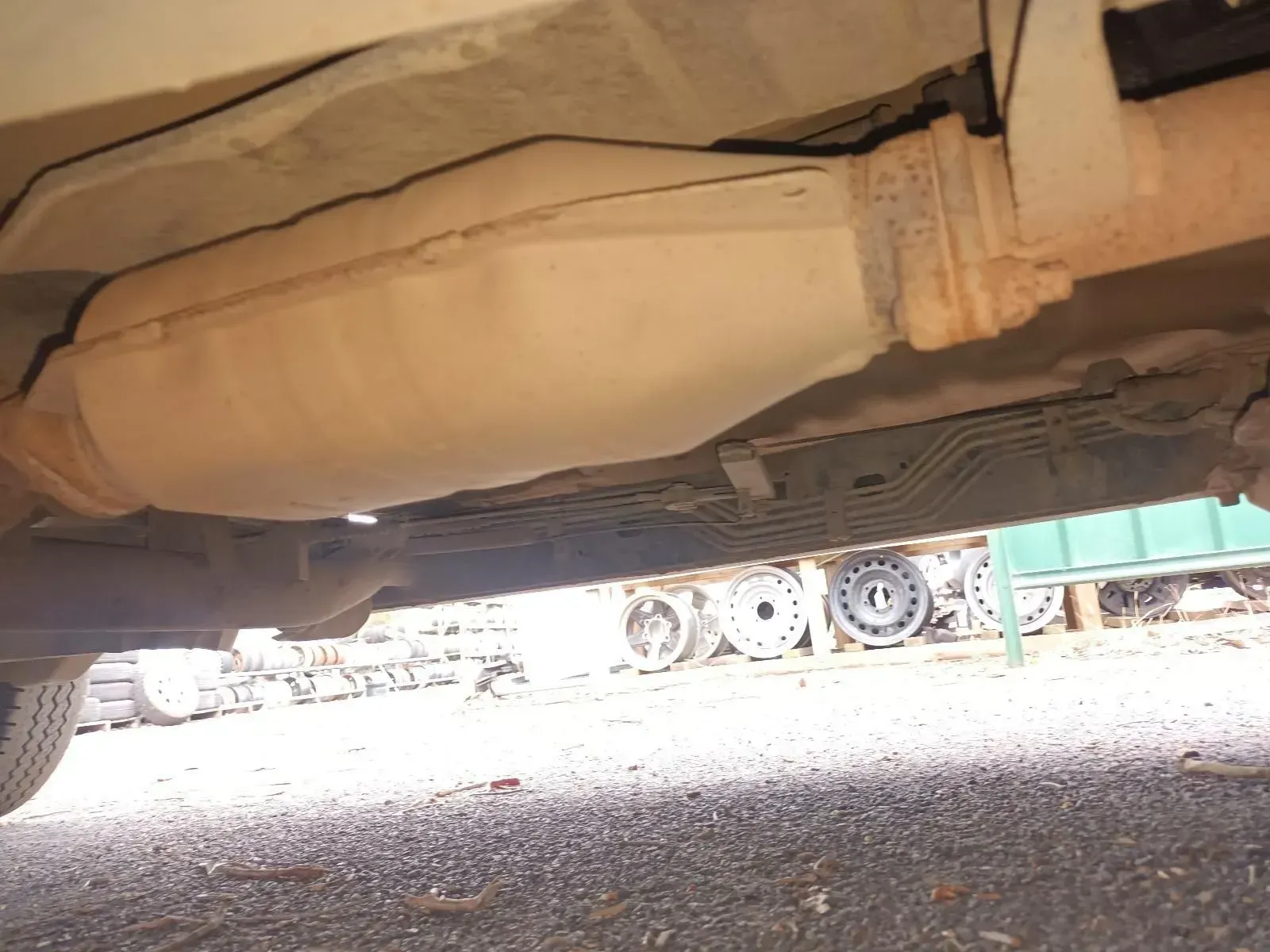 Underside of a Vehicle; a Rusty Catalytic Converter is Visible — South West 4WD Wreckers In Brisbane, QLD