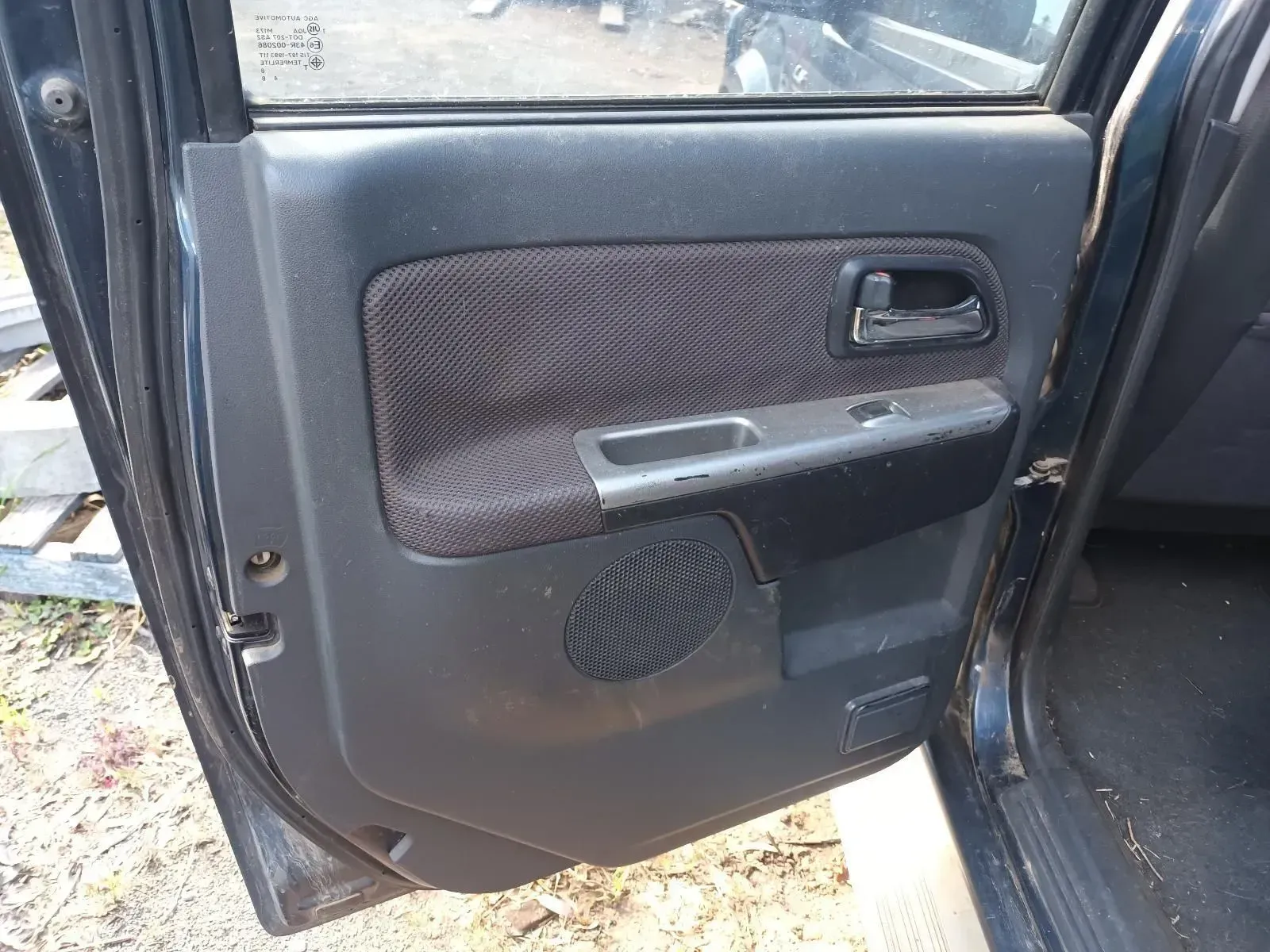 Black Car Door Interior With Fabric Panel, Speaker, Handle, and Window — South West 4WD Wreckers In Brisbane, QLD