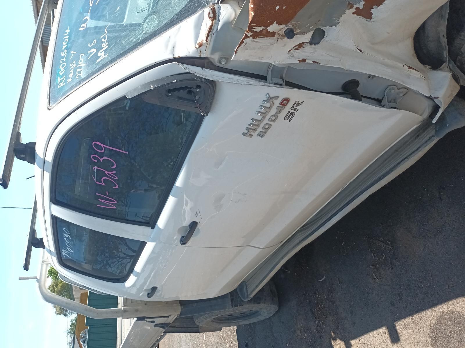 A White Truck with the Word Hilux on the Door — South West 4WD Wreckers in Harristown, QLD