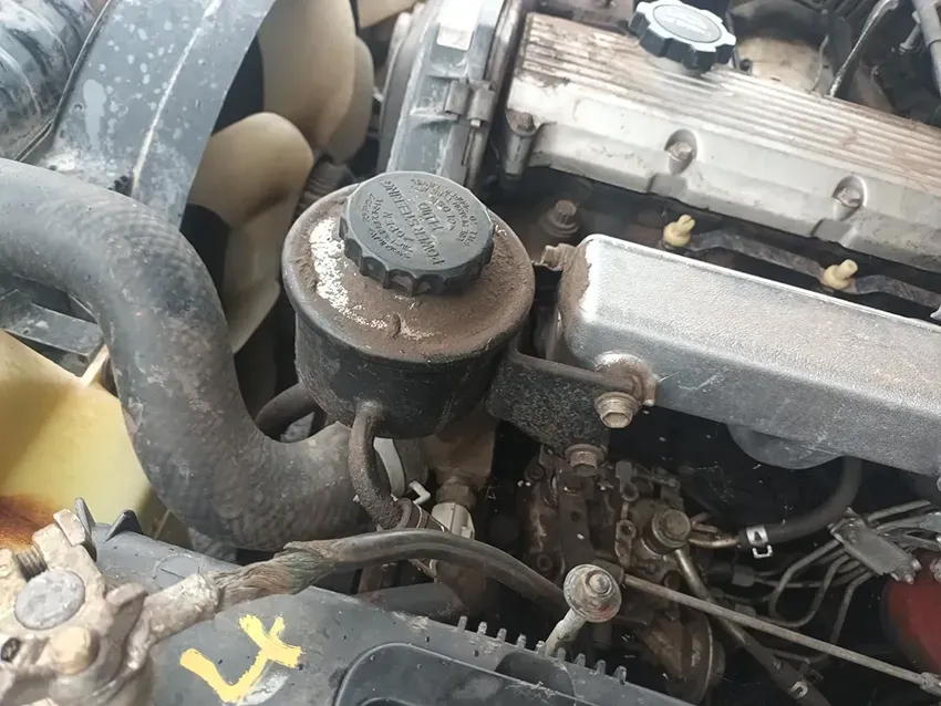 A Close Up of a Car Engine With a Black Cap on It — South West 4WD Wreckers In Brisbane, QLD