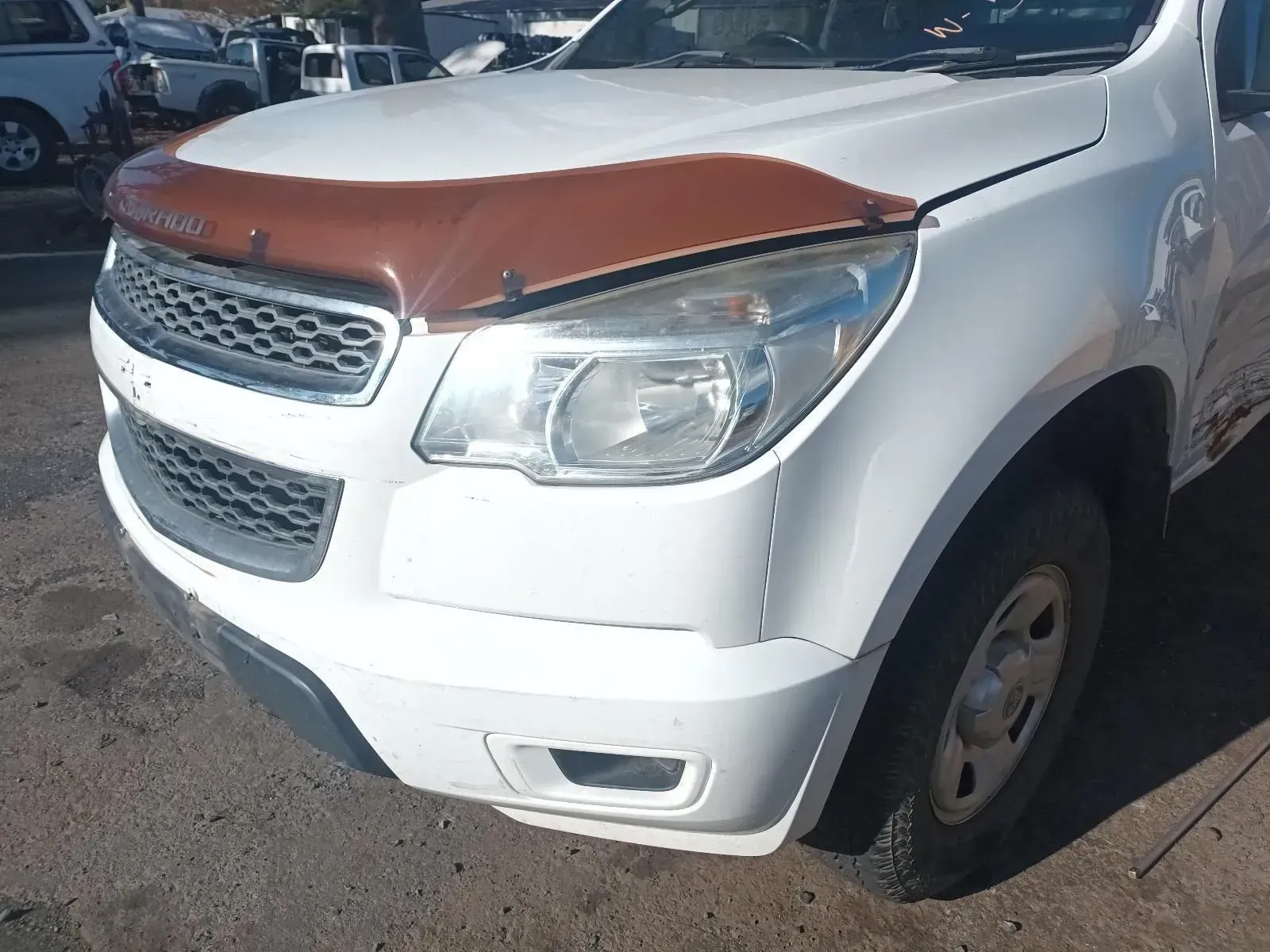 White Pickup Truck With Brown Hood Protector, Front View — South West 4WD Wreckers In Brisbane, QLD