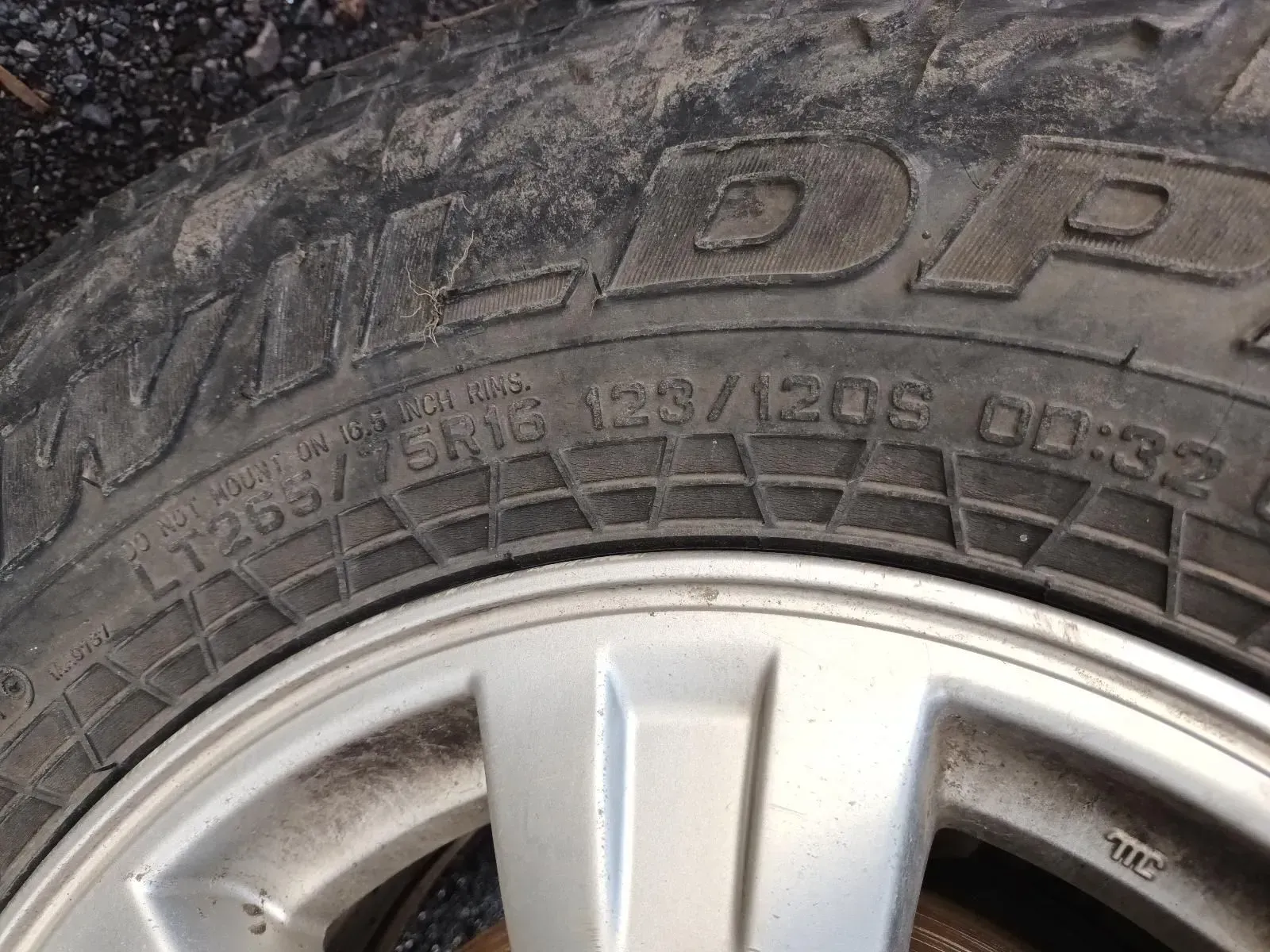 Close-up of a Dirty Tyre on a Silver Rim — South West 4WD Wreckers In Brisbane, QLD