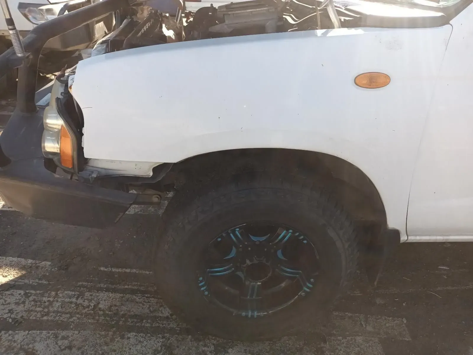 White Pickup Truck, Front Right Side View, Damaged Fender — South West 4WD Wreckers In Brisbane, QLD