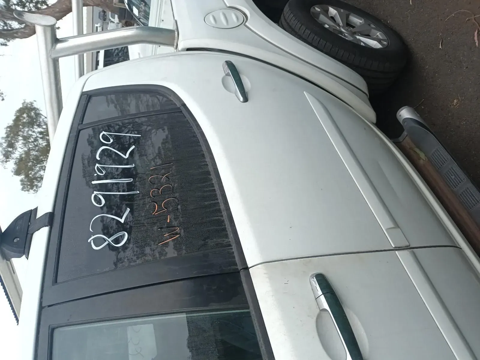 White Pickup Truck With Numbers on it — South West 4WD Wreckers In Brisbane, QLD