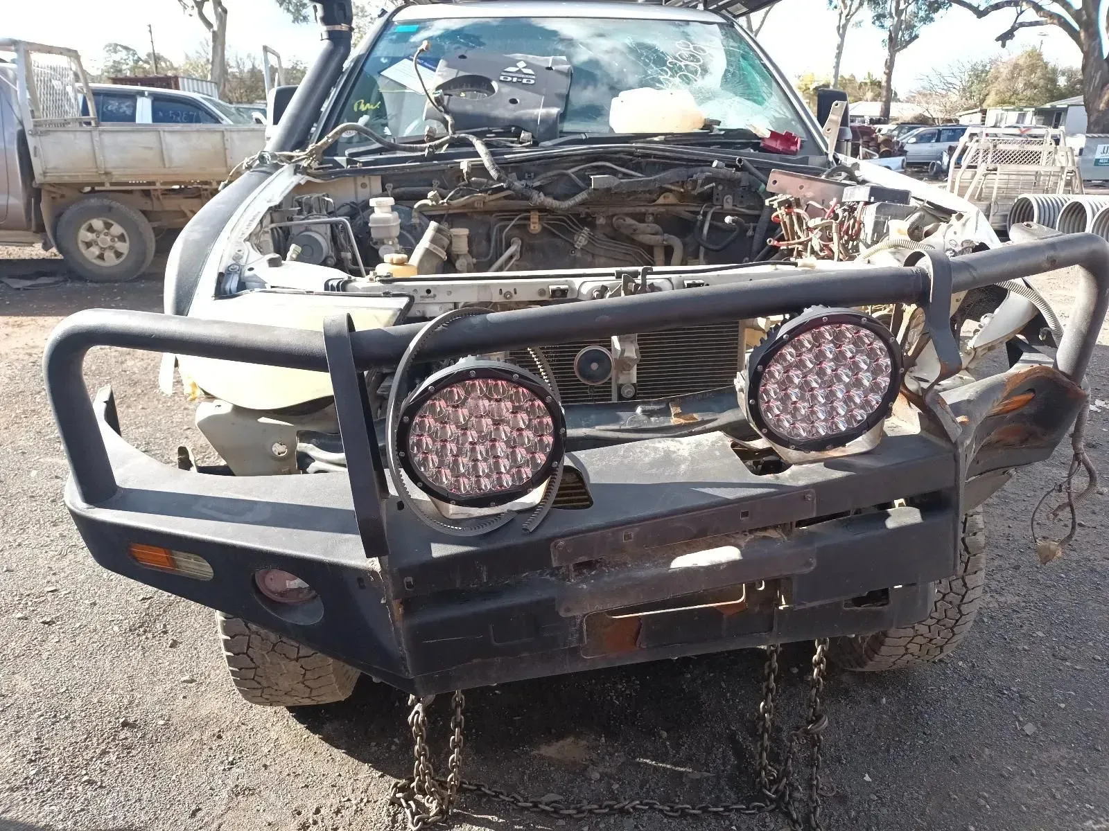 Damaged White Suv With Missing Front Hood and Smashed Windshield — South West 4WD Wreckers In Brisbane, QLD