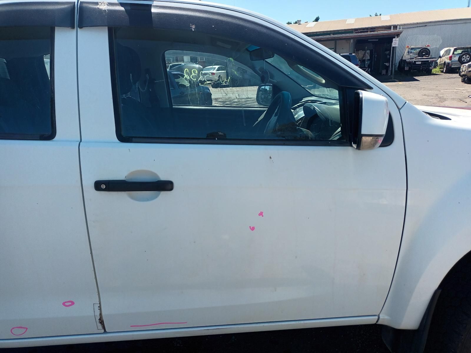 A White Truck is Parked in a Parking Lot — South West 4WD Wreckers In Brisbane, QLD