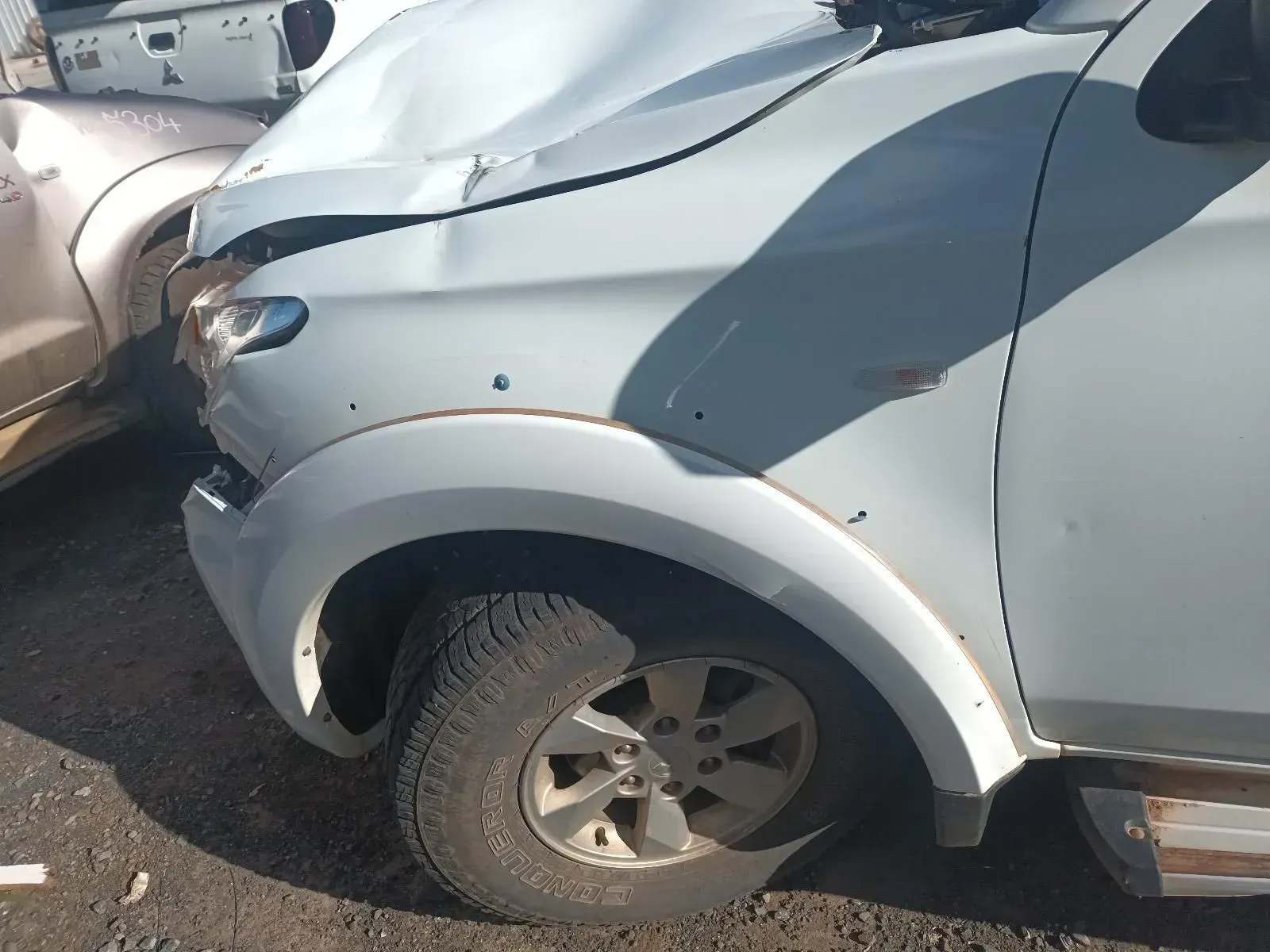 White Pickup Truck With Significant Front-end Damage — South West 4WD Wreckers In Brisbane, QLD