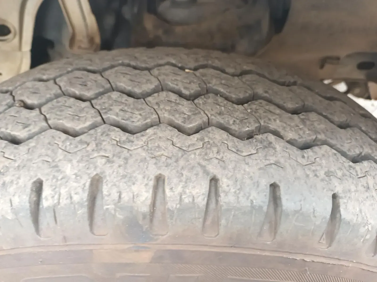 Close-up of a Worn Truck Tyre, Showing Cracks and Tread Wear — South West 4WD Wreckers In Brisbane, QLD
