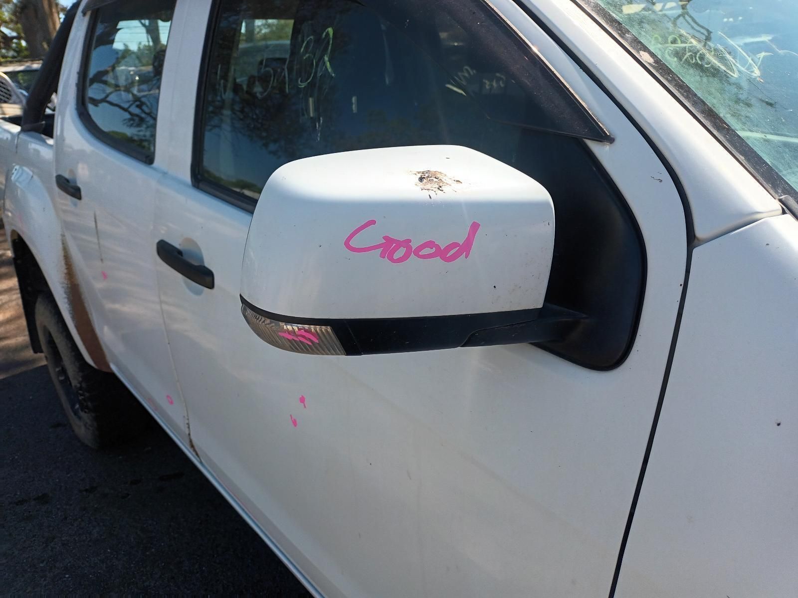 A White Truck With the Word Good Written on the Side Mirror — South West 4WD Wreckers In Brisbane, QLD