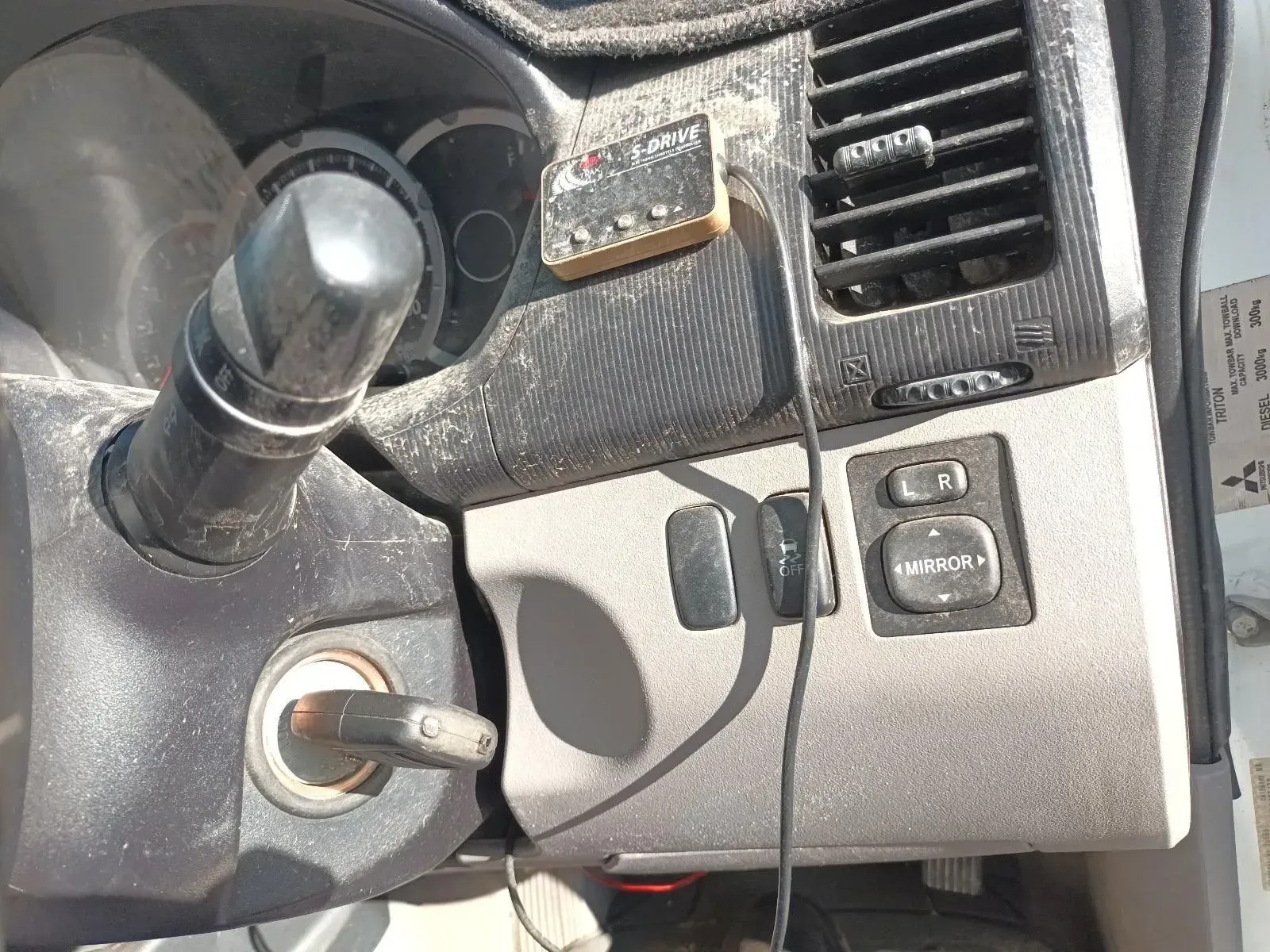 Car Dashboard With Ignition Key, Light Controls, and Mirror Adjustment Buttons — South West 4WD Wreckers In Brisbane, QLD