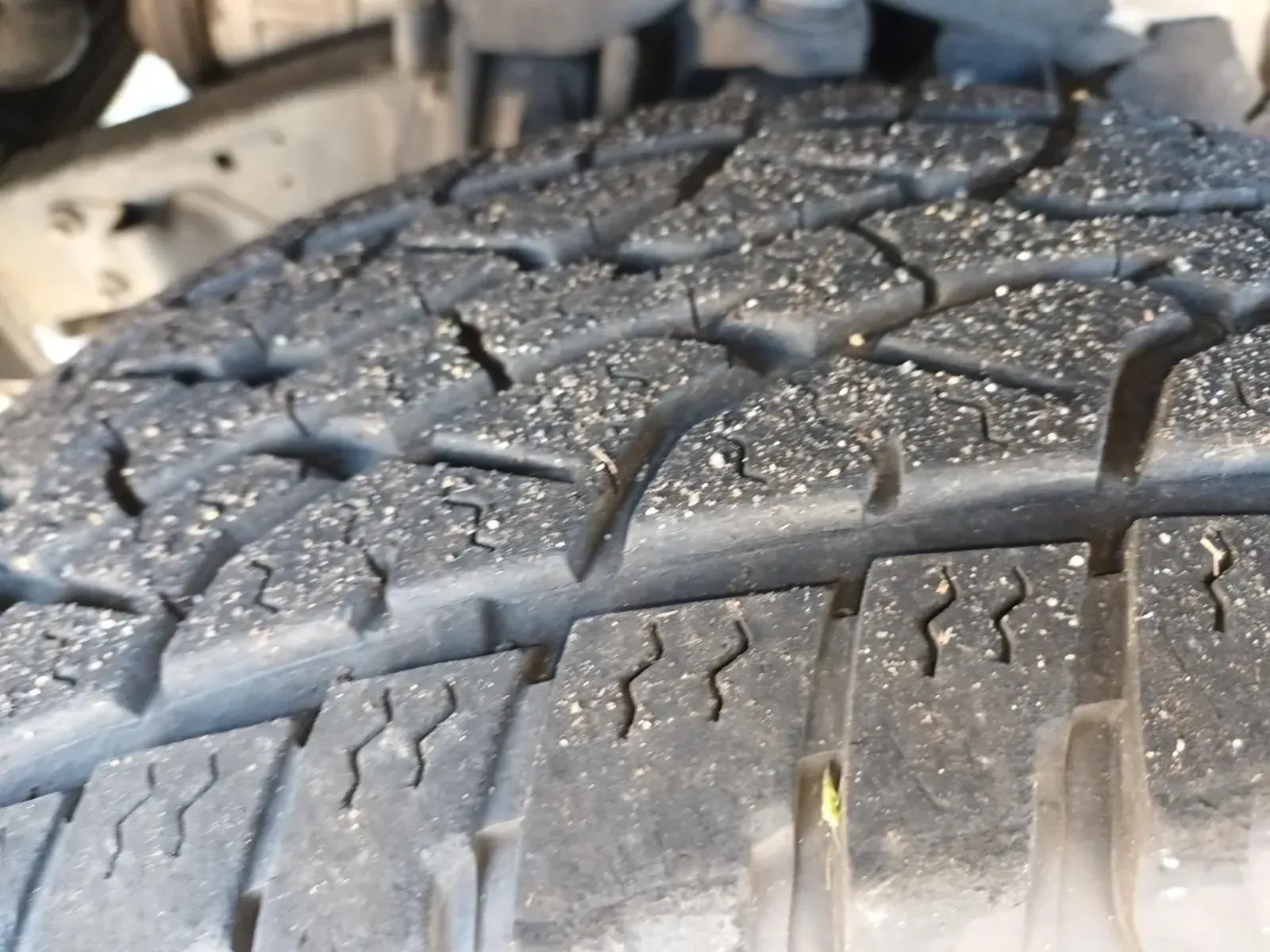 Close-up of a Car Tyre With Worn Tread Covered in Small Particles — South West 4WD Wreckers In Brisbane, QLD