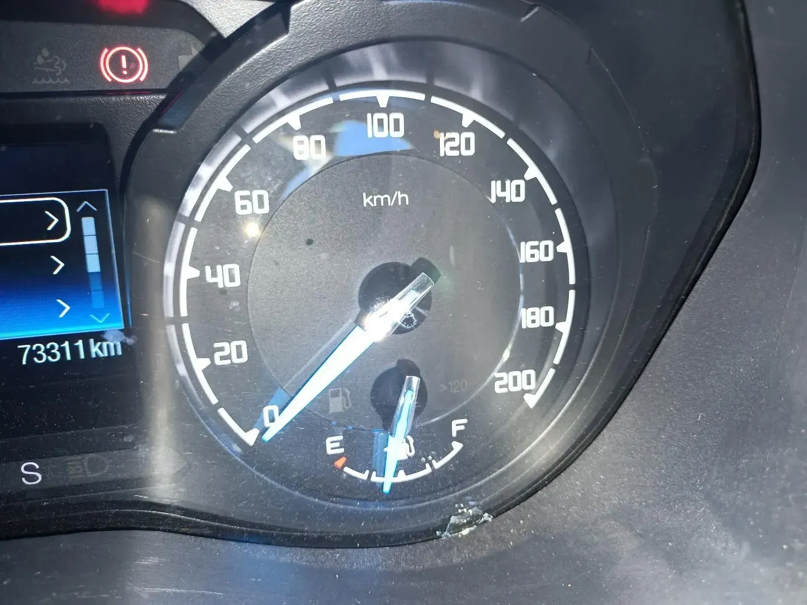 Car Dashboard With Speedometer Showing 80 Km/h and Fuel Gauge Near Empty — South West 4WD Wreckers In Brisbane, QLD