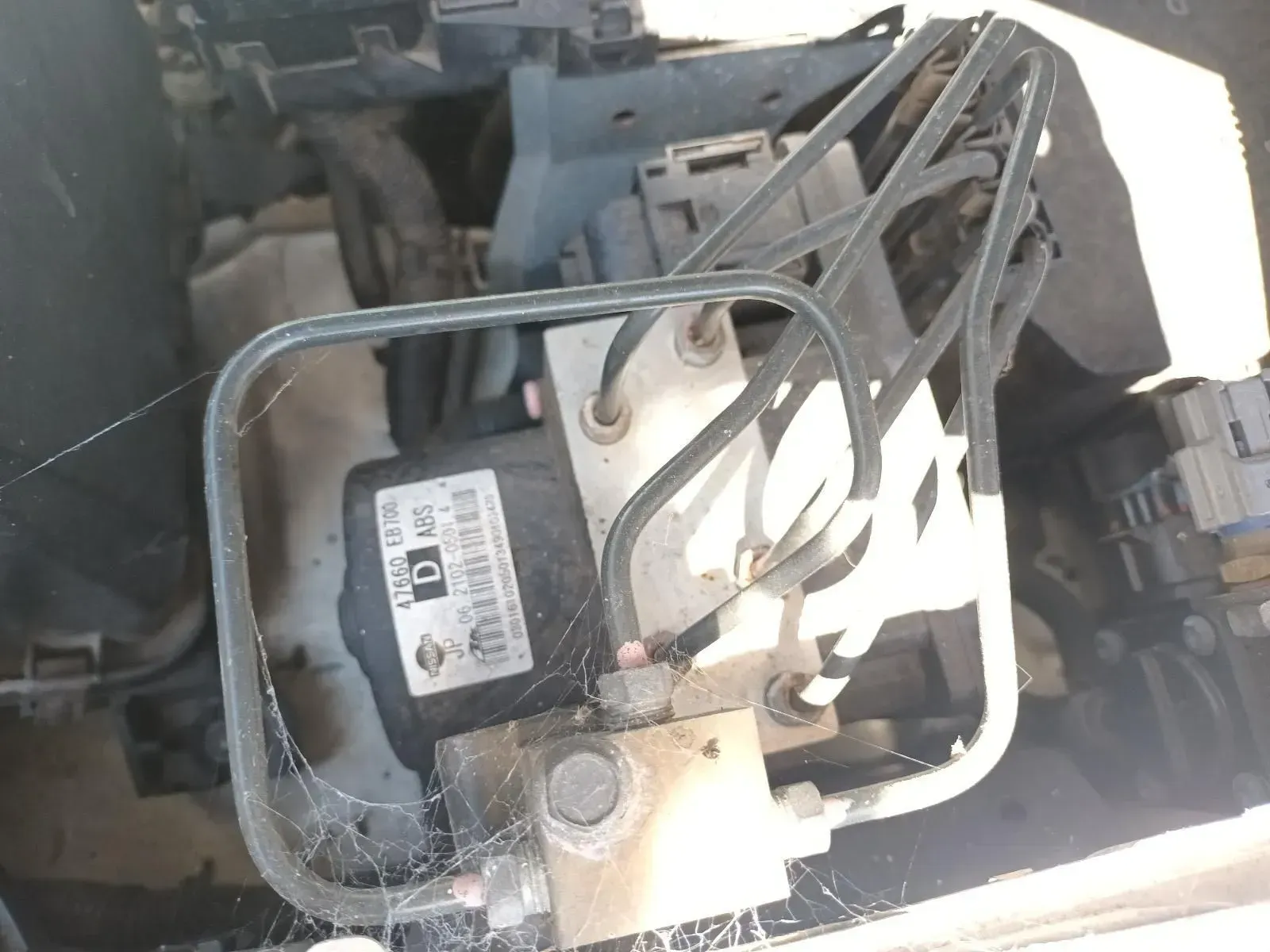 An Abs Module in a Vehicle, With Brake Lines and Wiring — South West 4WD Wreckers In Brisbane, QLD