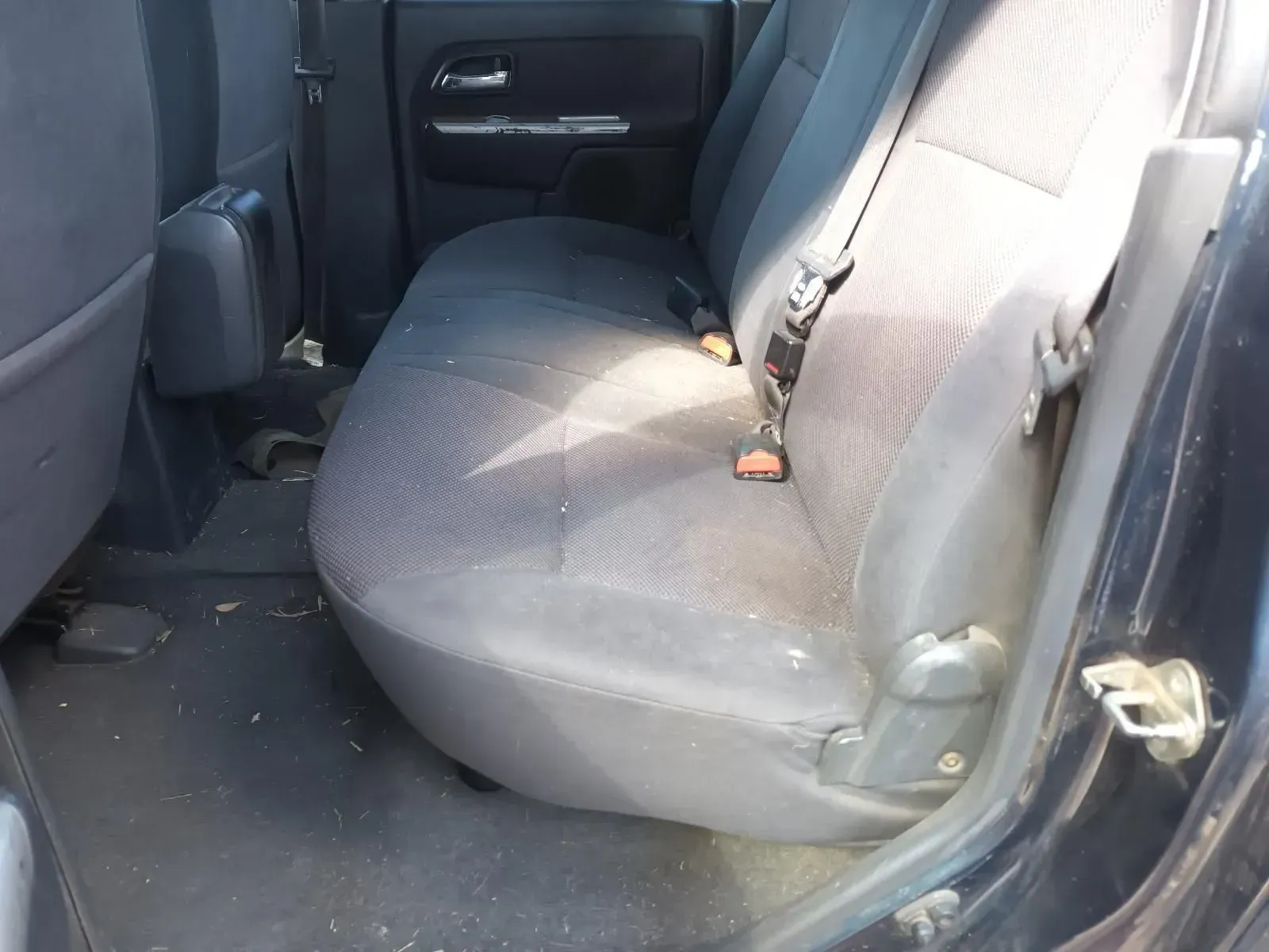 Dark Vehicle Backseat, Covered in Dust and Debris — South West 4WD Wreckers In Brisbane, QLD