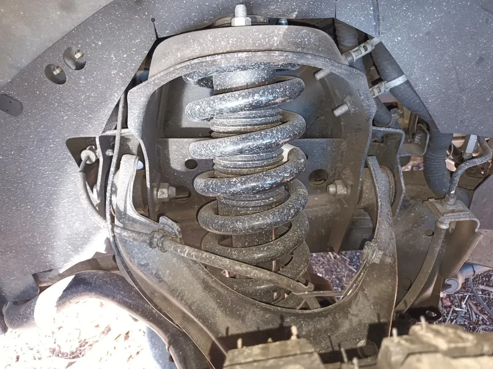 Car's Front Suspension, Showing a Coil Spring — South West 4WD Wreckers In Brisbane, QLD