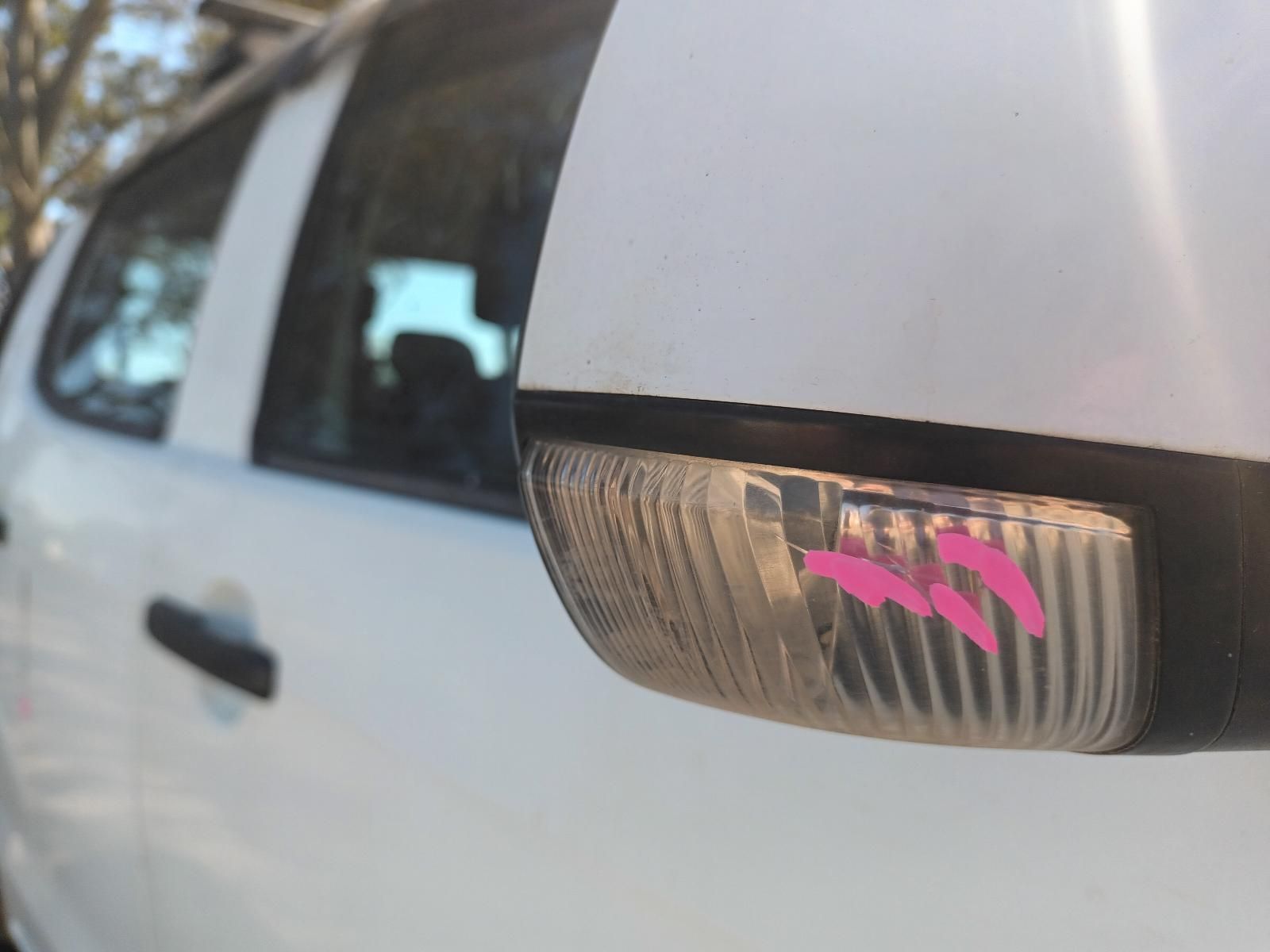 A Close Up of a Side View Mirror on a White Car — South West 4WD Wreckers In Brisbane, QLD