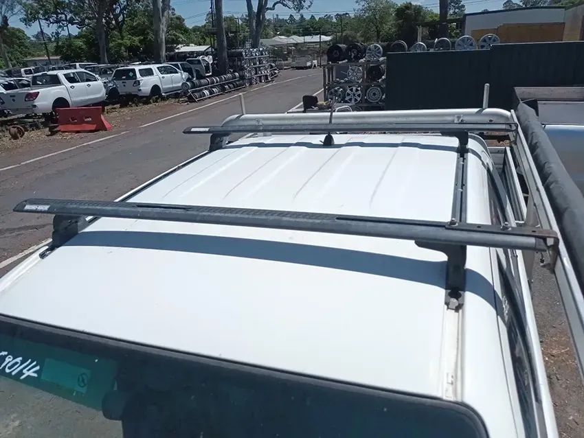 The Roof of a White Truck With a Roof Rack Attached to It — South West 4WD Wreckers In Brisbane, QLD