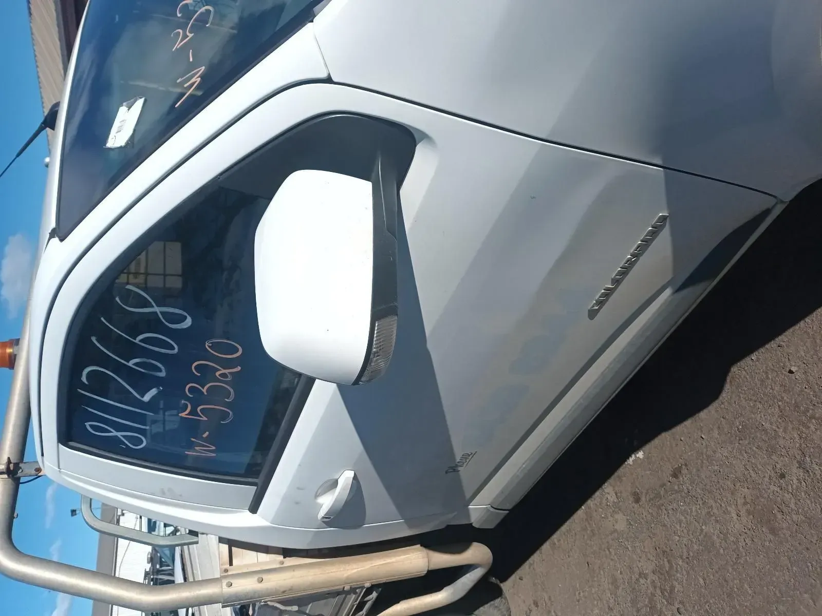 White Holden Colorado Truck, Side View With Mirror Extended, Parked Outside — South West 4WD Wreckers In Brisbane, QLD